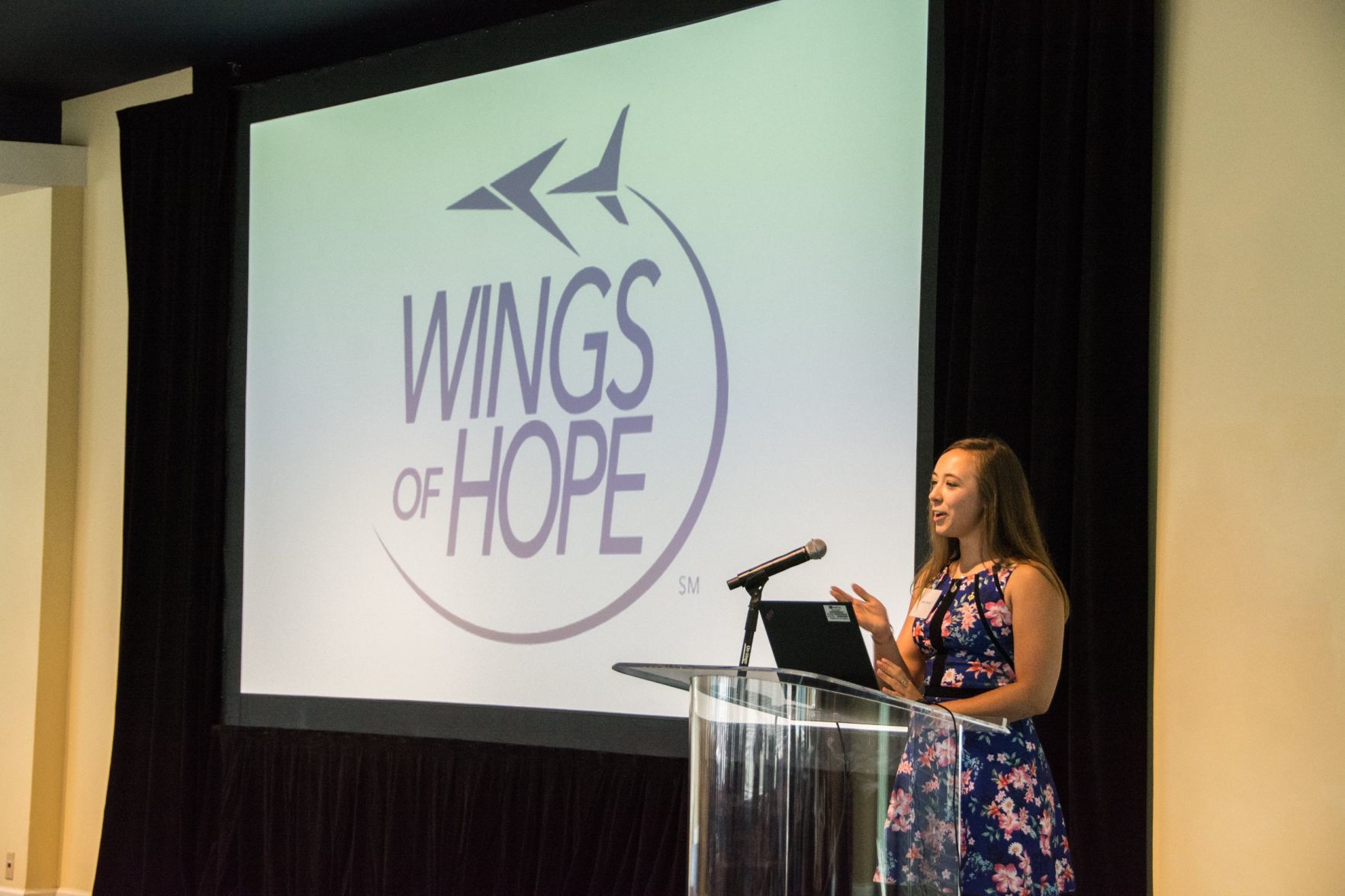 Emily Mueth, a recent graduate of SLU Nursing gives an introduction to the featured speaker of the afternoon